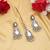 White color kundan earrings tikka set