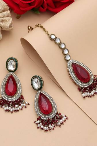 Maroon color kundan earrings tikka set