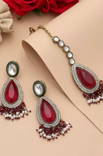 Maroon color kundan earrings tikka set