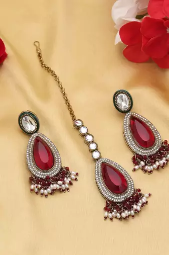 Maroon color kundan earrings tikka set