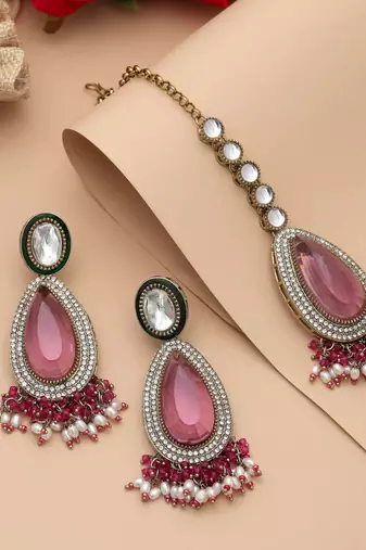 Rani color kundan earrings tikka set