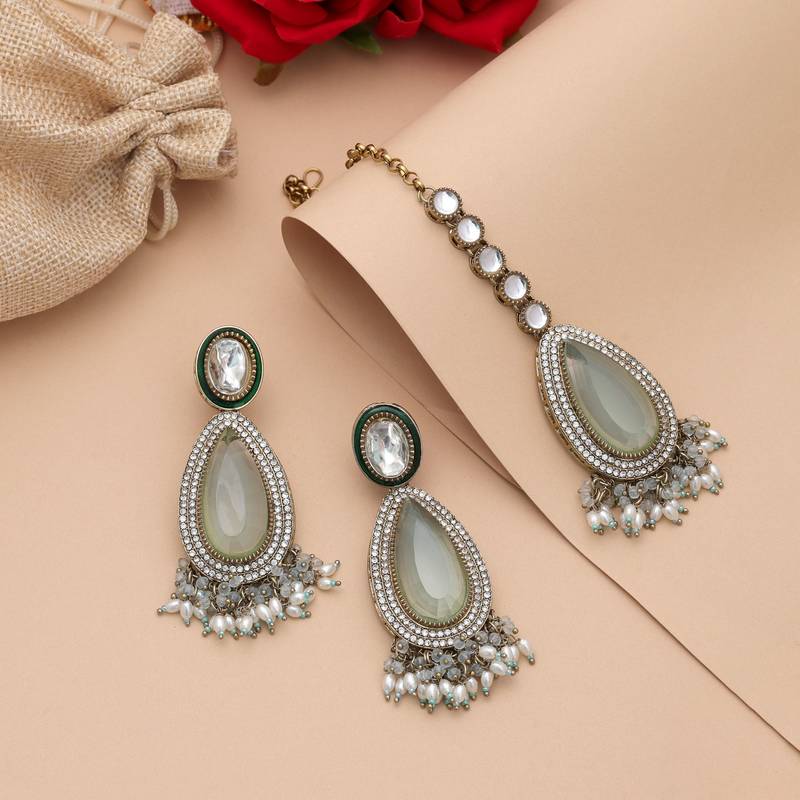 Sky blue color kundan earrings tikka set