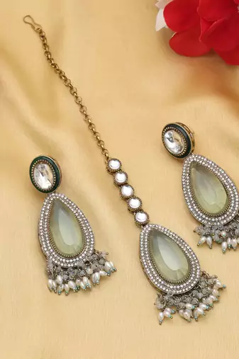 Sky blue color kundan earrings tikka set