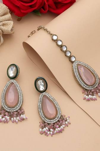 Light pink color kundan earrings tikka set