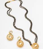 gold-tone ganesh pendant and leaf chain mangalsutra set with ad stone paan pendant and earrings