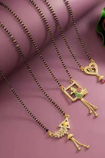 gold-tone ad stone mangalsutra combo set with peacock, heart, and baguette crystal pendants