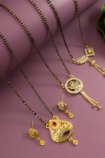 traditional gold-tone ad stone mangalsutra set with floral pendant and peacock design