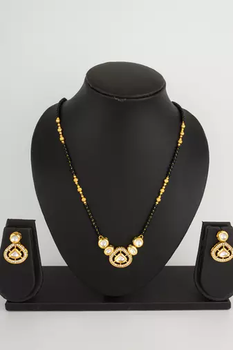 kundan mangalsutra set with black beads chain and crystal studded earrings