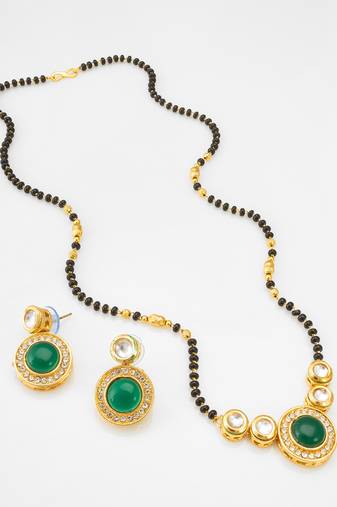 kundan mangalsutra set with green stone circular pendant and crystal earrings