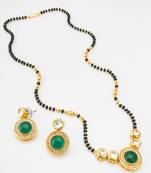 kundan mangalsutra set with green stone circular pendant and crystal earrings