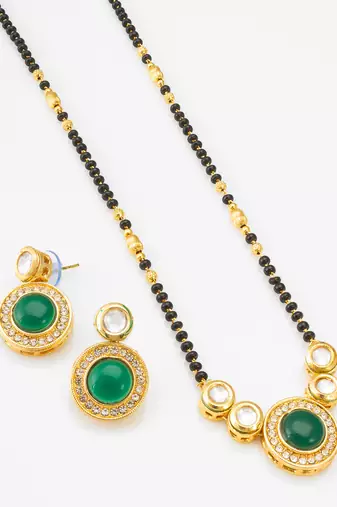 kundan mangalsutra set with green stone circular pendant and crystal earrings