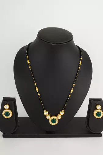 kundan mangalsutra set with green stone circular pendant and crystal earrings