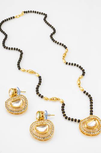 kundan mangalsutra set with  polki pendant and crystal studded circular earrings