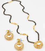 kundan mangalsutra set with  polki pendant and crystal studded circular earrings