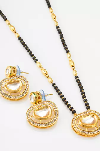 kundan mangalsutra set with  polki pendant and crystal studded circular earrings
