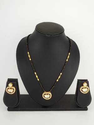 kundan mangalsutra set with  polki pendant and crystal studded circular earrings 5