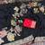black meenakari figure flower georgette saree