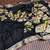 black meenakari figure flower georgette saree