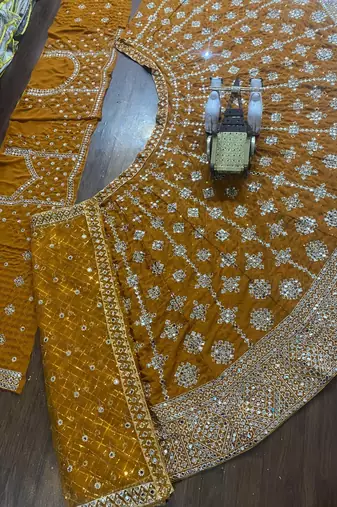 yellow georgette embroidered lehenga choli