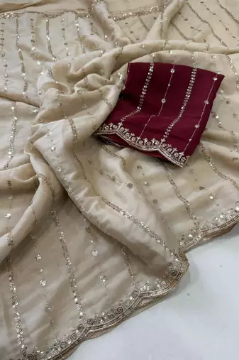 cream georgette embroidered saree with blouse