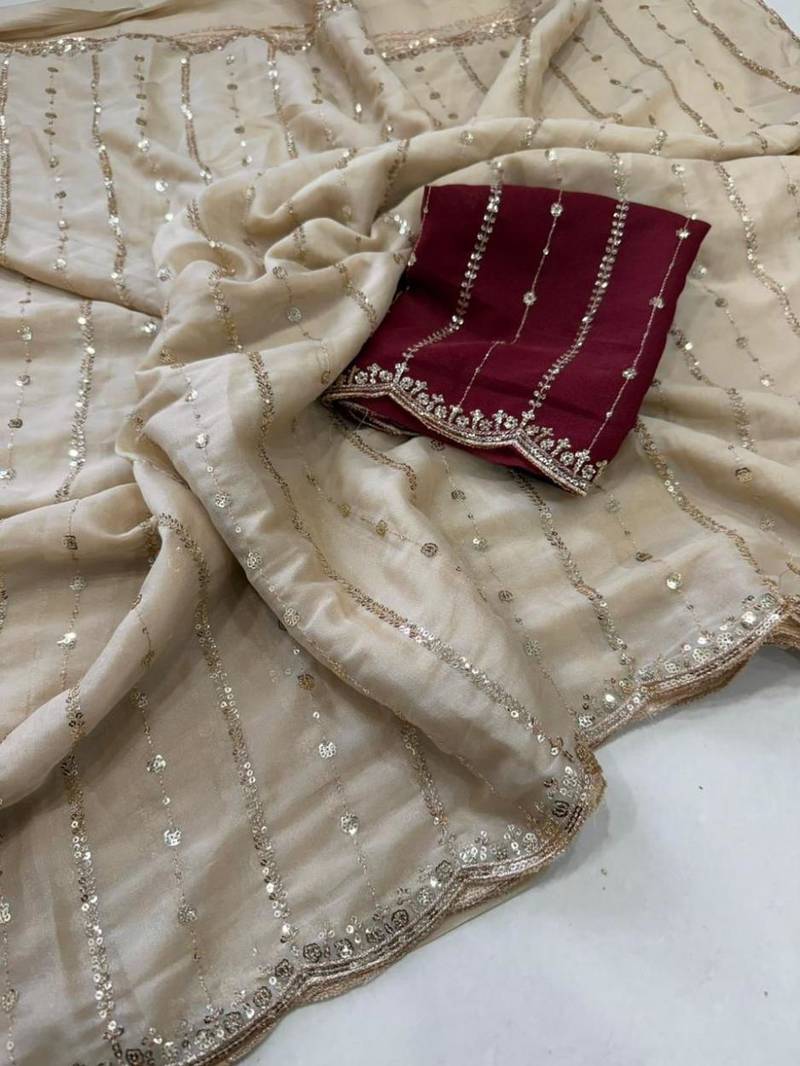 cream georgette embroidered saree with blouse