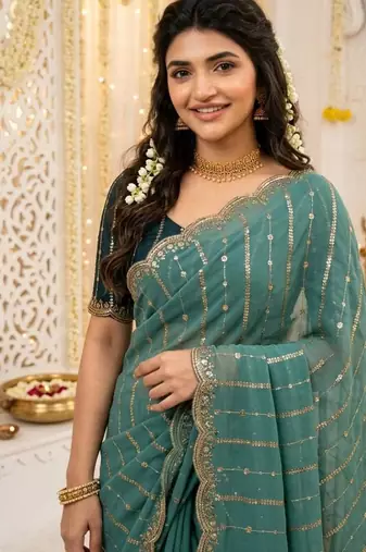 Rama color georgette embroidered work saree with un-stitch blouse