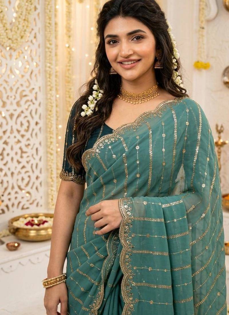 Rama color georgette embroidered work saree with un-stitch blouse