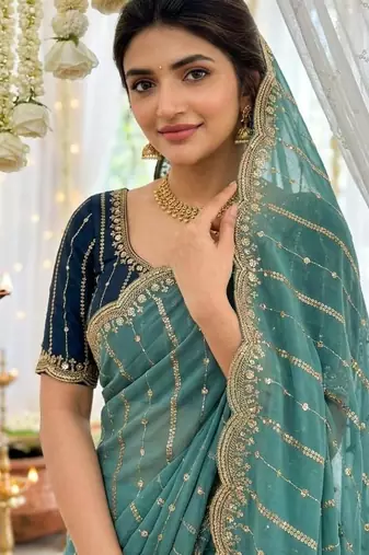 Rama color georgette embroidered work saree with un-stitch blouse