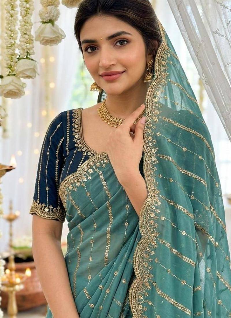 Rama color georgette embroidered work saree with un-stitch blouse