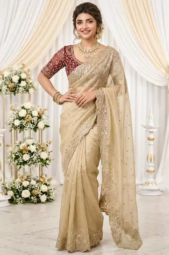 cream georgette embroidered saree with blouse