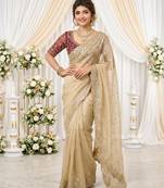 cream georgette embroidered saree with blouse