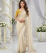 off-white georgette embroidered saree with blouse