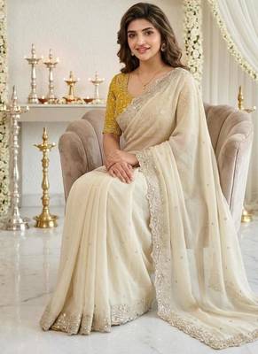 off-white georgette embroidered saree with blouse 3