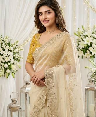 off-white georgette embroidered saree with blouse 4