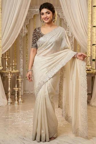 Off-White georgette embroidered saree with blouse