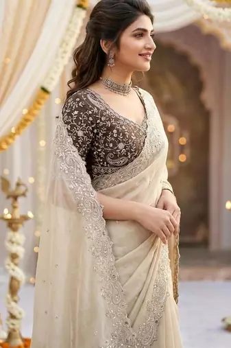 Off-White georgette embroidered saree with blouse