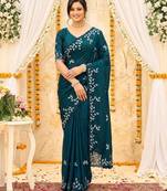 aqua blue georgette embroidered saree with blouse