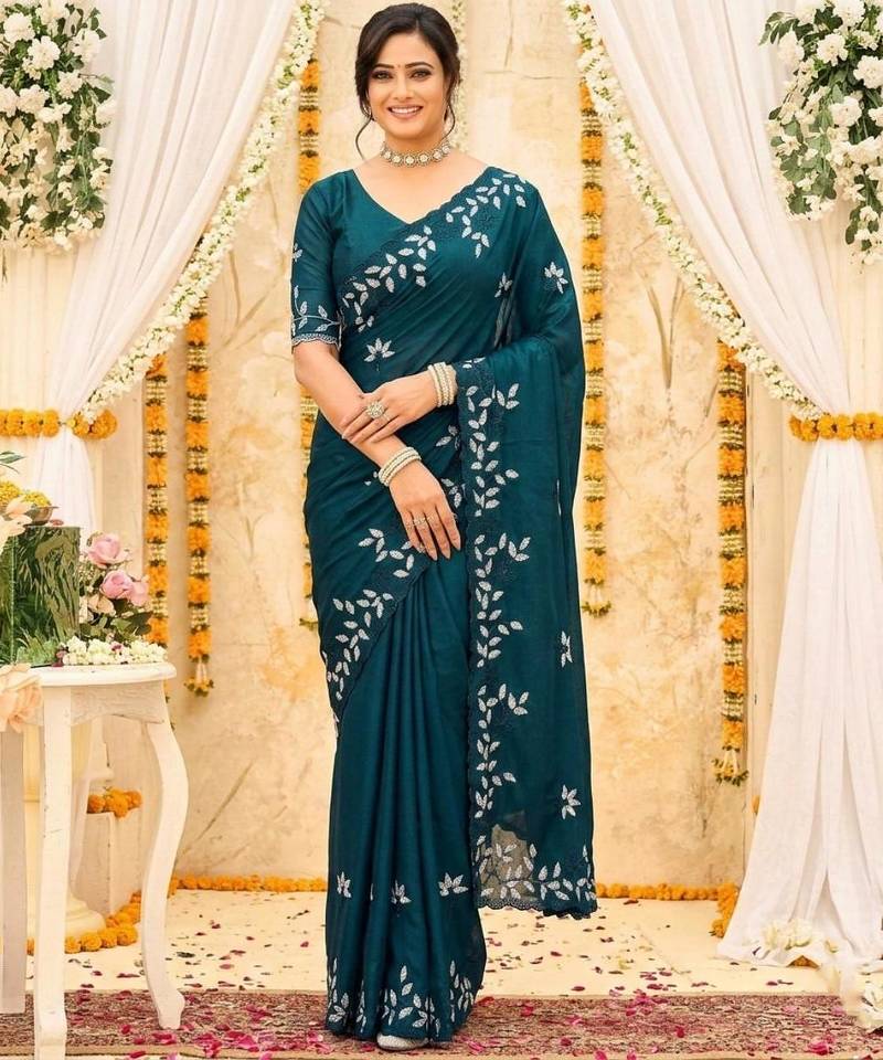 aqua blue georgette embroidered saree with blouse