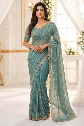 sea green satin embroidered saree with blouse