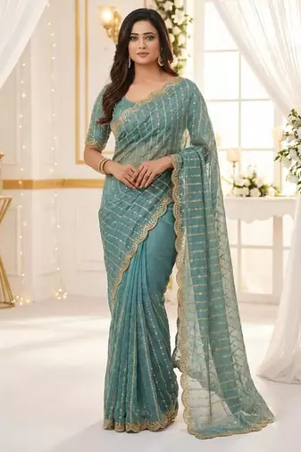 sea green satin embroidered saree with blouse