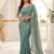 sea green satin embroidered saree with blouse