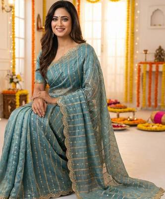 sea green satin embroidered saree with blouse 2