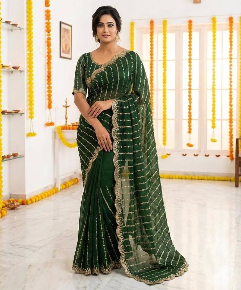 green satin embroidered saree with blouse
