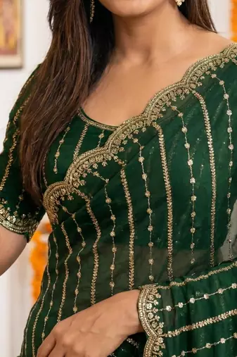 green satin embroidered saree with blouse