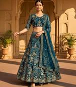 teal net embroidered lehenga choli