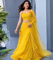 yellow organza embroidered lehenga choli with free size upto 38