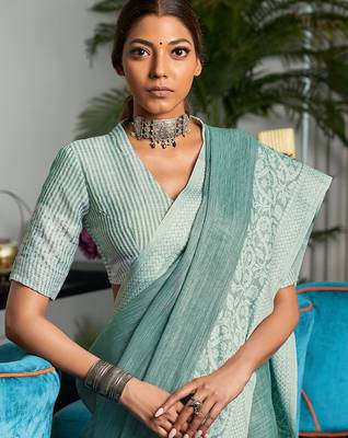 Lea green inen silk saree with elegant work 2