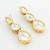 gold plated triple teardrop kundan earrings