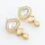 tiered kundan articulated earrings