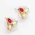 gold plated red kundan and pearl border stud earrings